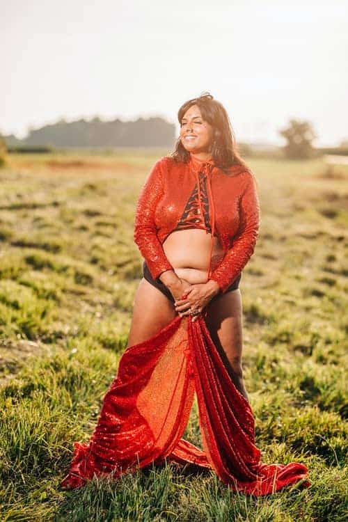 A woman standing in a field